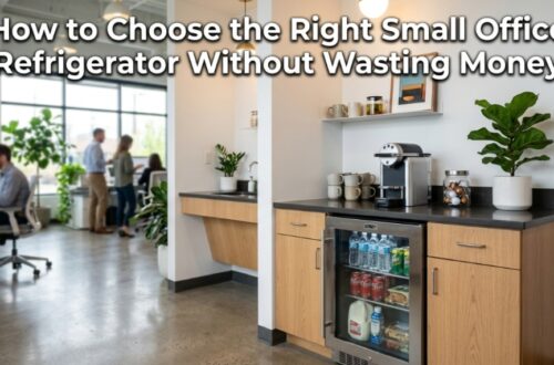 Sleek stainless steel small office refrigerator under a breakroom counter with the article title text overlay.